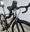 Silniční kolo SPECIALIZED Roubaix SL8 Sport Apex Carbon/Smoke 2025