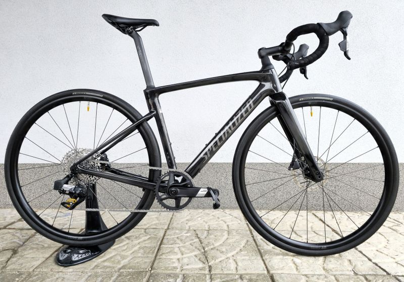 Silniční kolo SPECIALIZED Roubaix SL8 Sport Apex Carbon/Smoke 2025