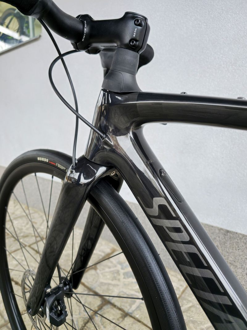 Silniční kolo SPECIALIZED Roubaix SL8 Sport Apex Carbon/Smoke 2025