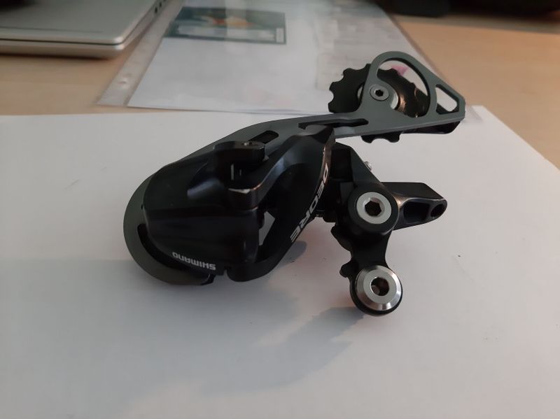 Přesmykač SRAM X.5, Přehazovačka Shimano Deore, Kliky Stout xc, Řadící páčky SHIMANO Deore