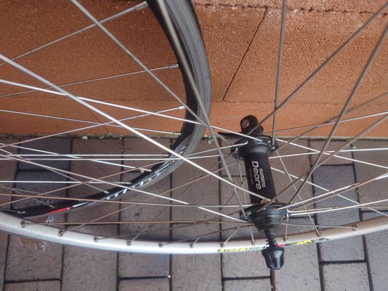 zapletená kola 28", náboje Shimano Deore