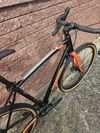 Rock Machine Gravelride 200 (L) gloss black/brick orange/silver