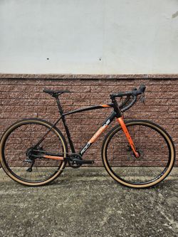 Rock Machine Gravelride 200 (L) gloss black/brick orange/silver