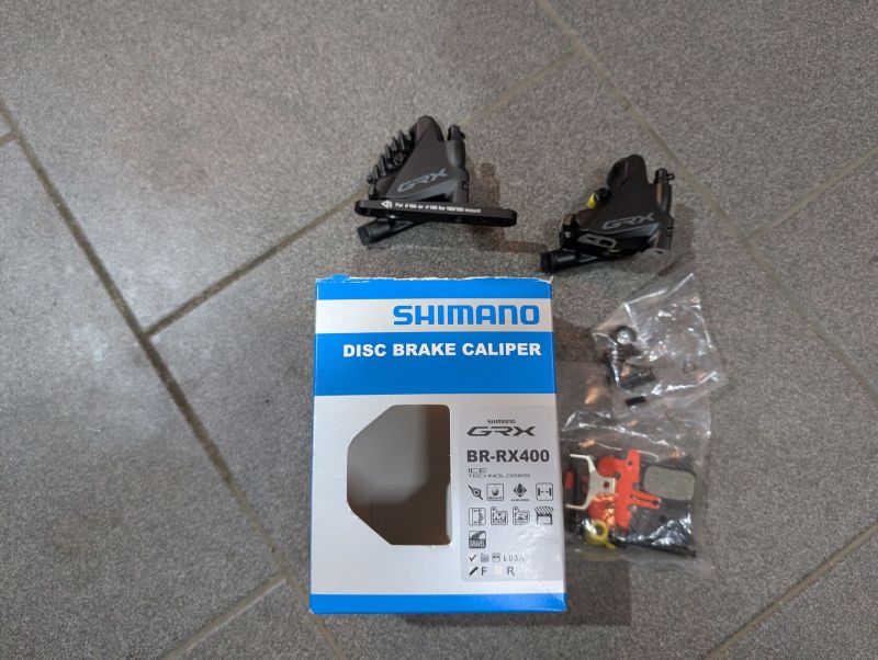 Brzdy Shimano GRX 400, přední + zadní vč. desek, nové 