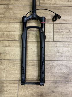 Vidlice Rock Shox SID - Debon Air vč. zamykání z řídítek a pevné osy.