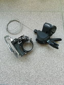 Přesmykač Shimano Deore s páčkou